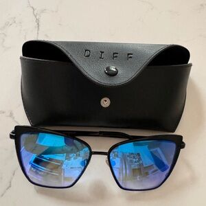 Diff brand sunglasses. Never used. Comes with case and cloth for glasses.